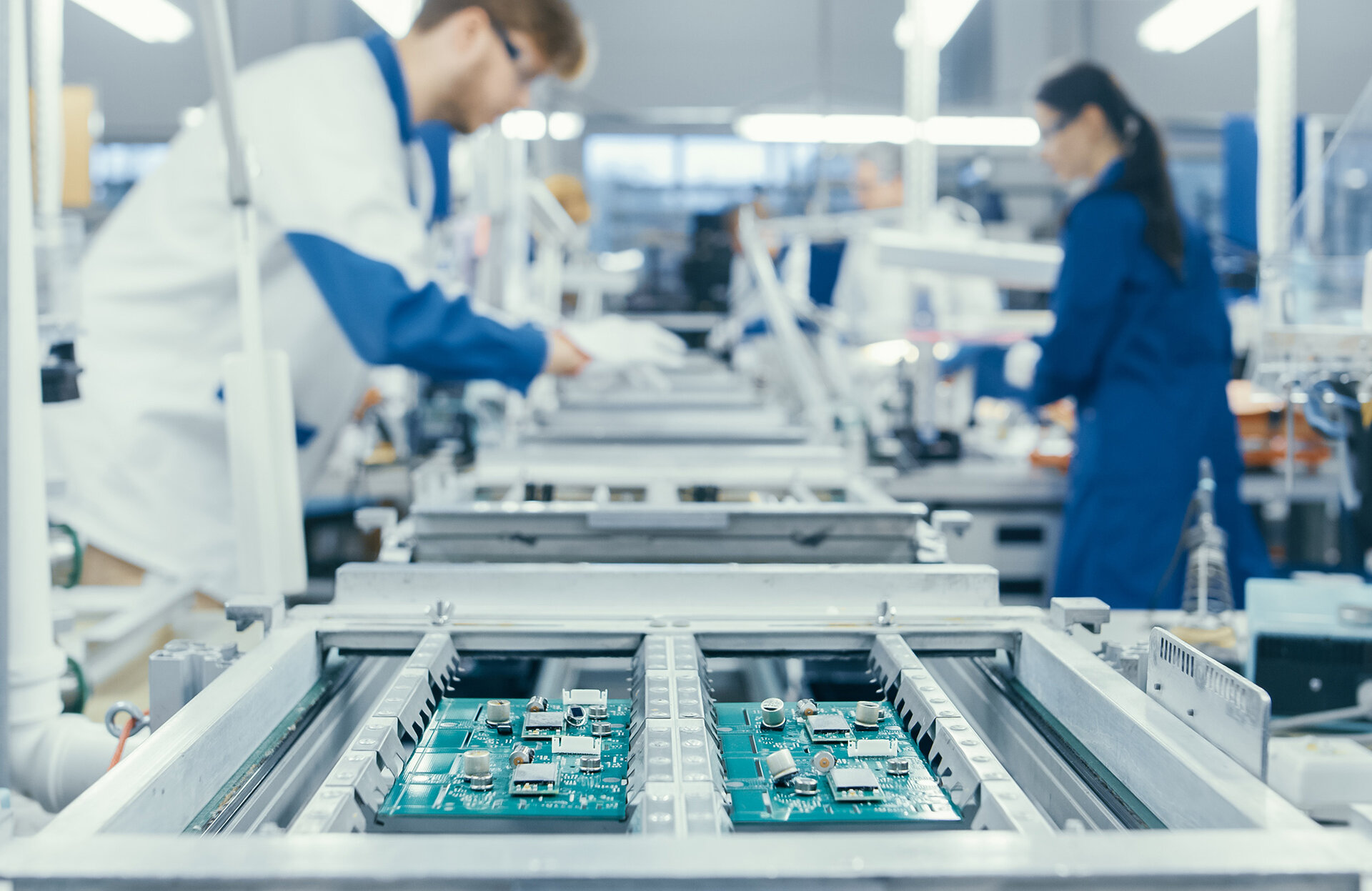 The picture shows a production line for electric vehicles in which the assemblies are prepared. 
